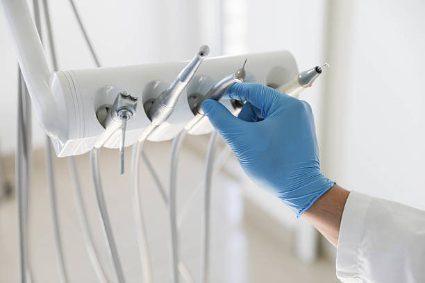 Professional Tooth Extraction technician working in Winnsboro Mills, SC